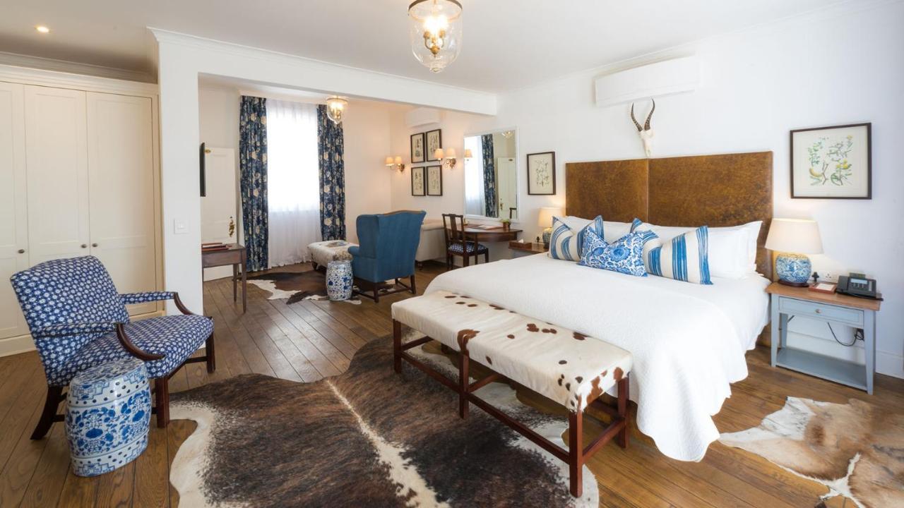 Drostdy Hotel Graaff-Reinet Eksteriør bilde A bedroom at the Cape Heritage