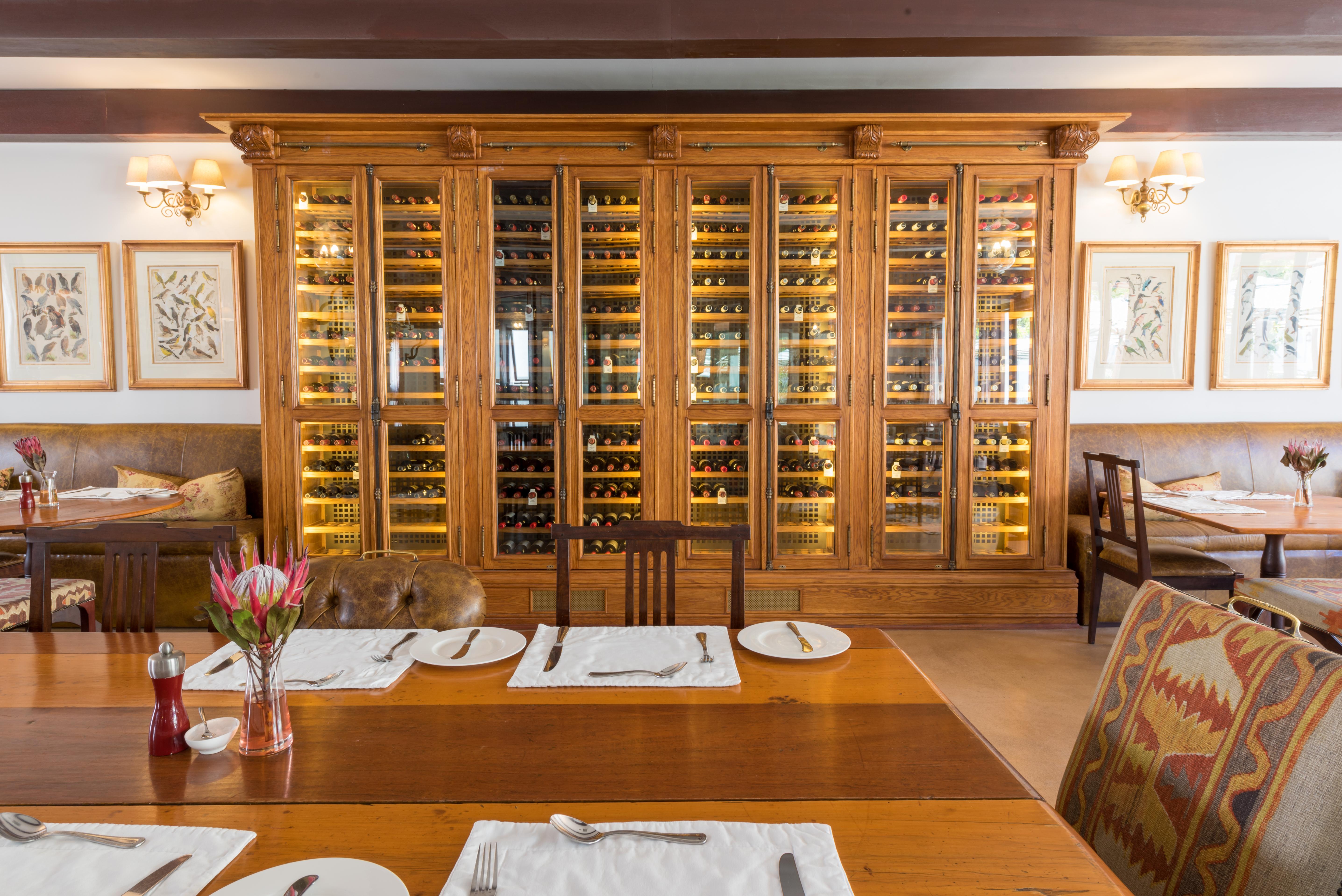 Drostdy Hotel Graaff-Reinet Eksteriør bilde Wine rack at the restaurant